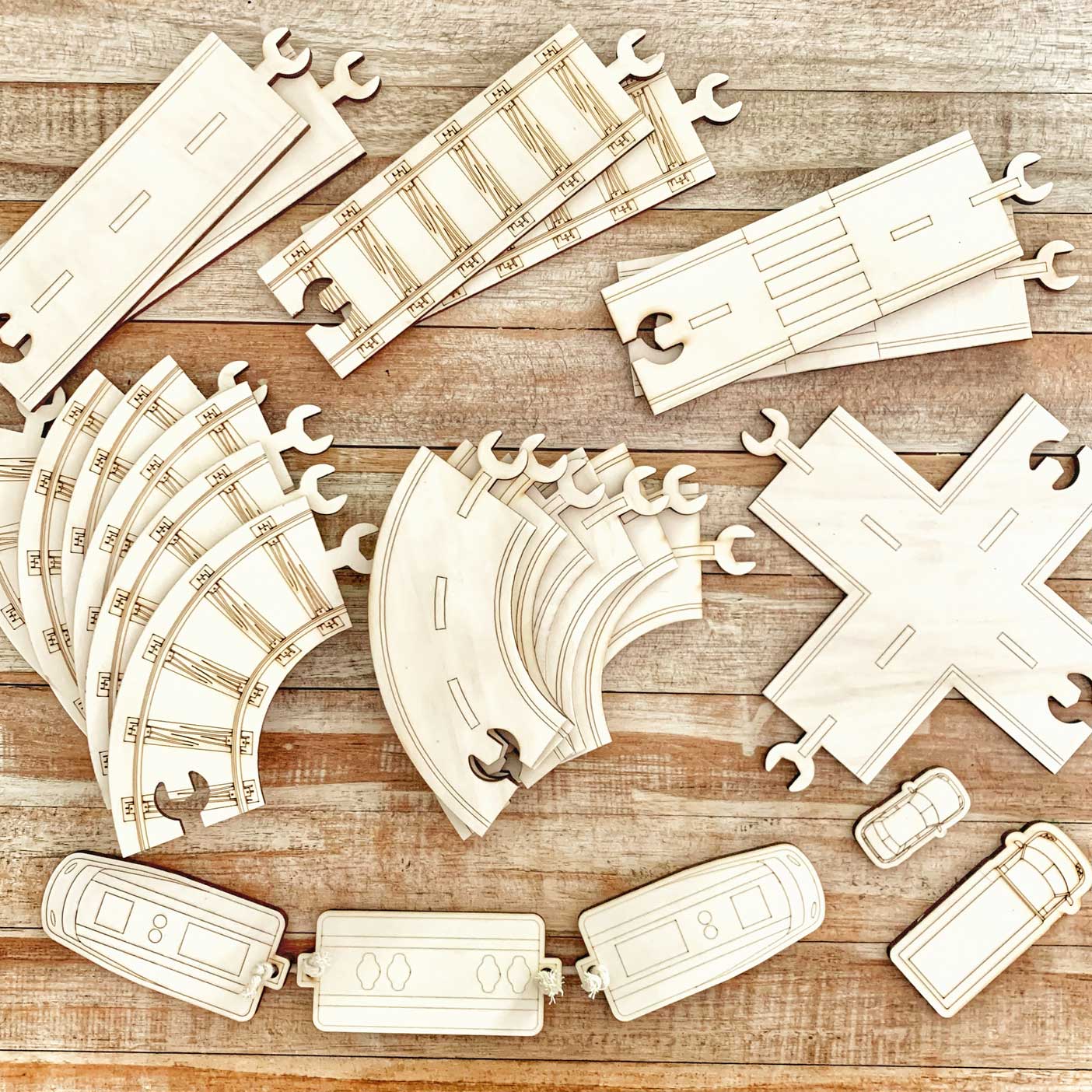 Wooden toy train tracks discount